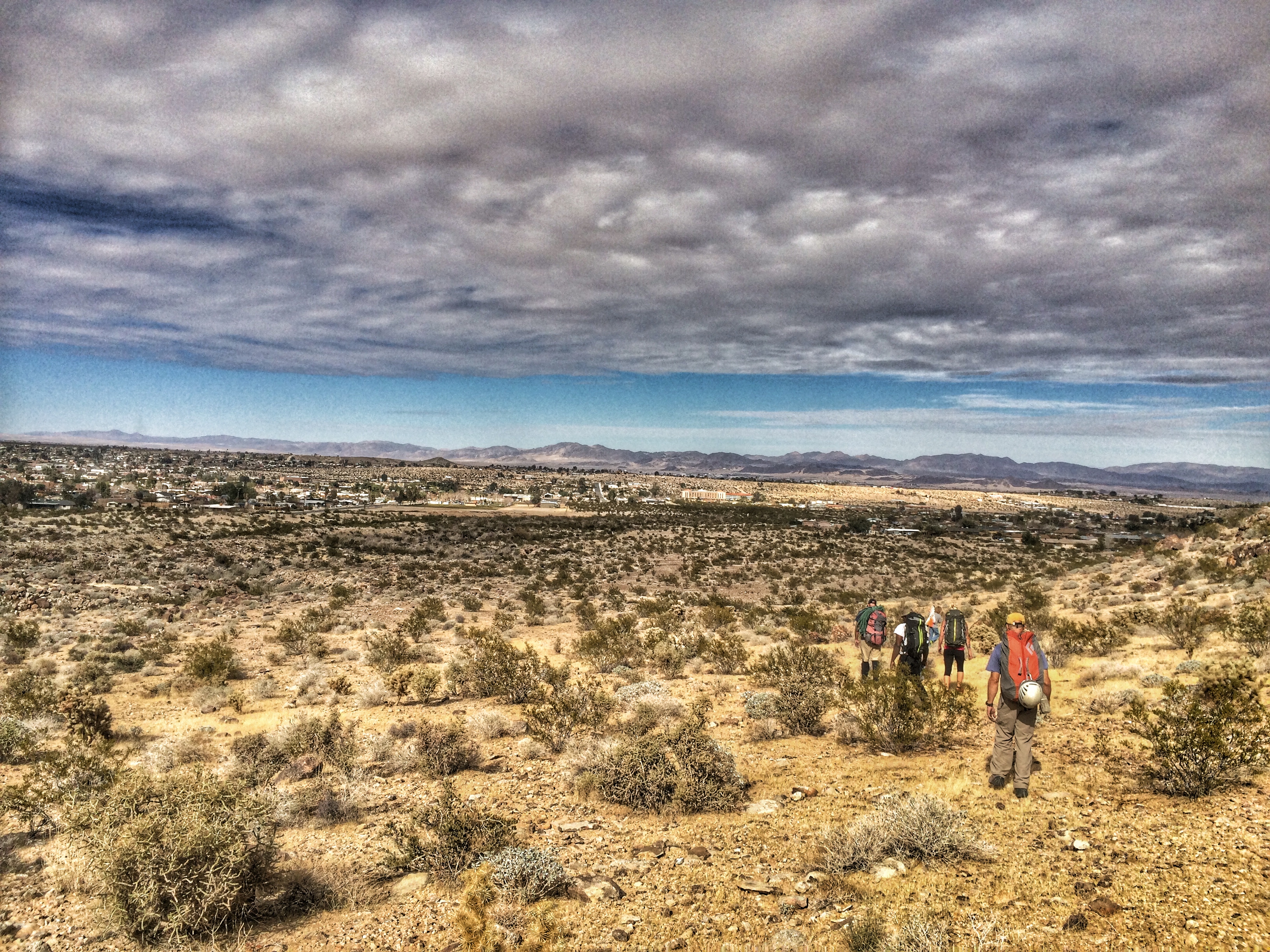 New friends, heading back from climbing rocks. Simple, but profound.