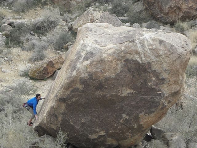Working out some moves on a possibly unclimbed boulder--some really cool lines on this one!